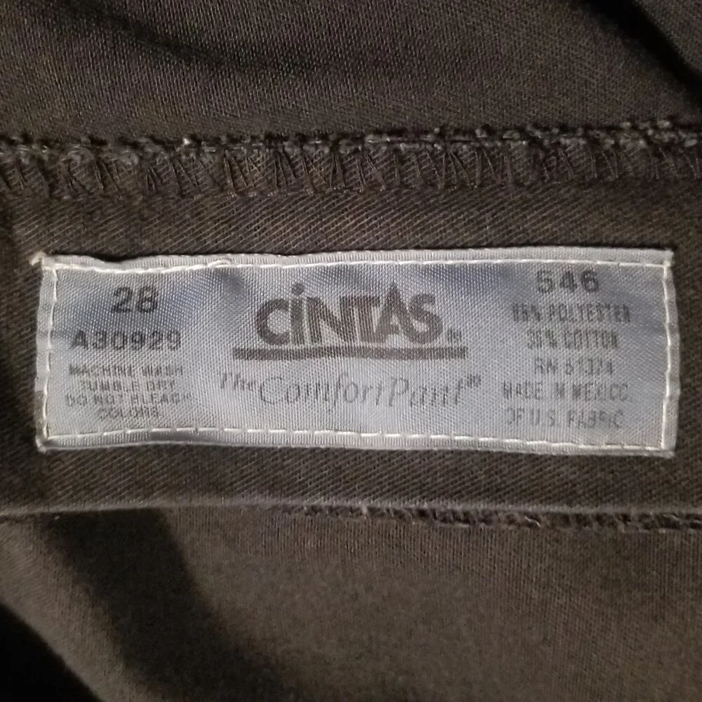 Three stained Cintas men's pants with stretching waistbands